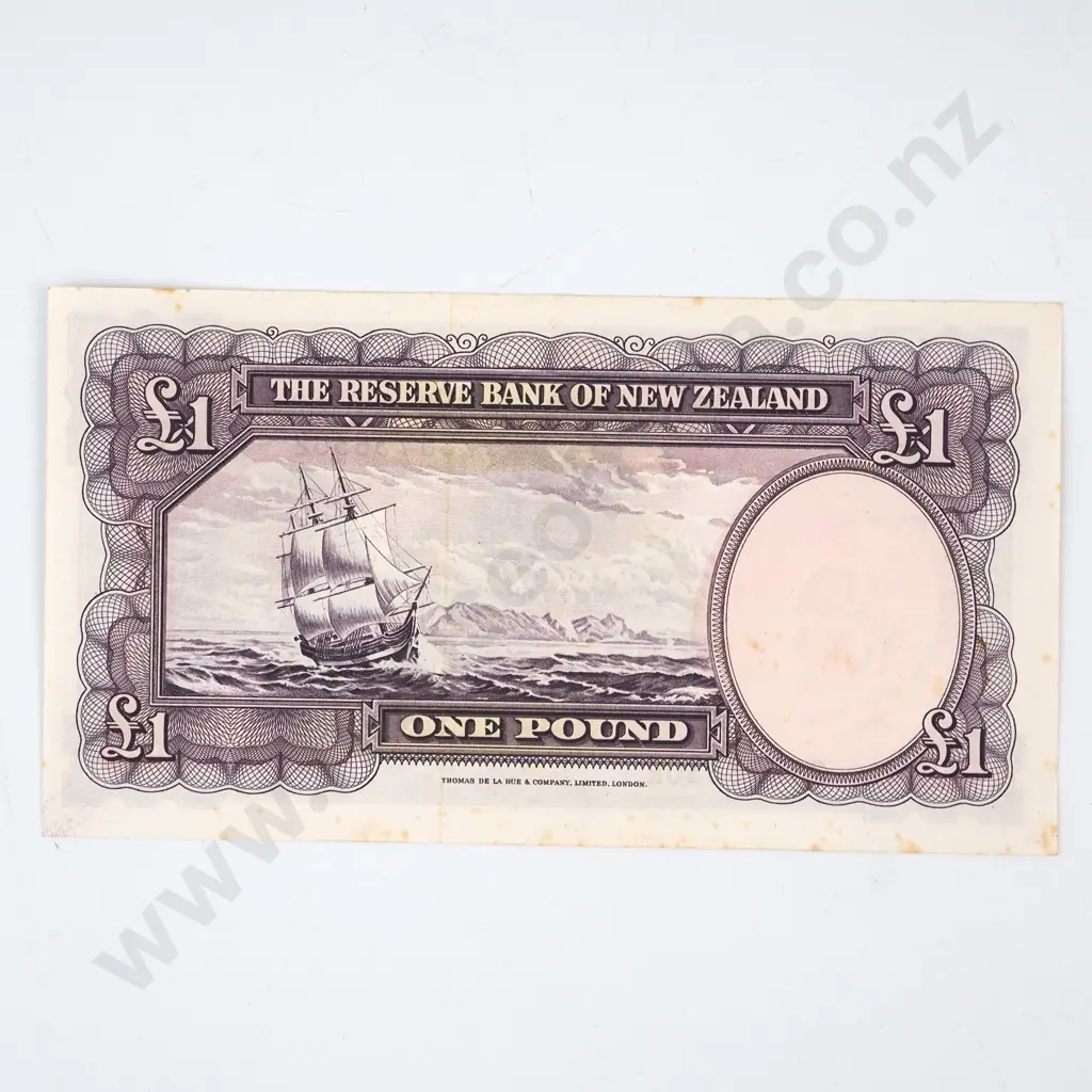 ONE POUND, FLEMING SIGNATURE, SERIAL 283 738302, ALMOST UNCIRCULATED, C.V. $130 Image 1++