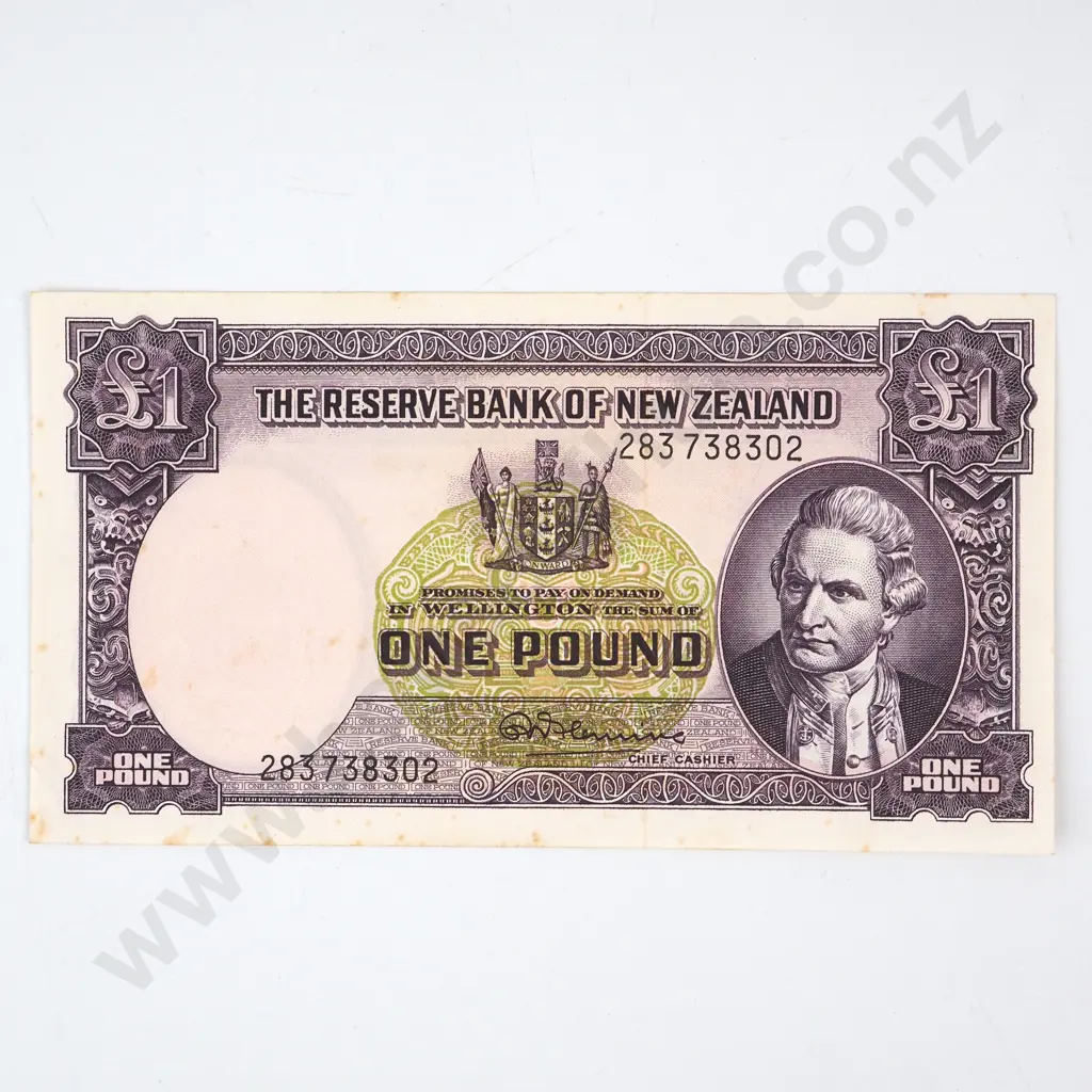 ONE POUND, FLEMING SIGNATURE, SERIAL 283 738302, ALMOST UNCIRCULATED, C.V. $130 Image 1++