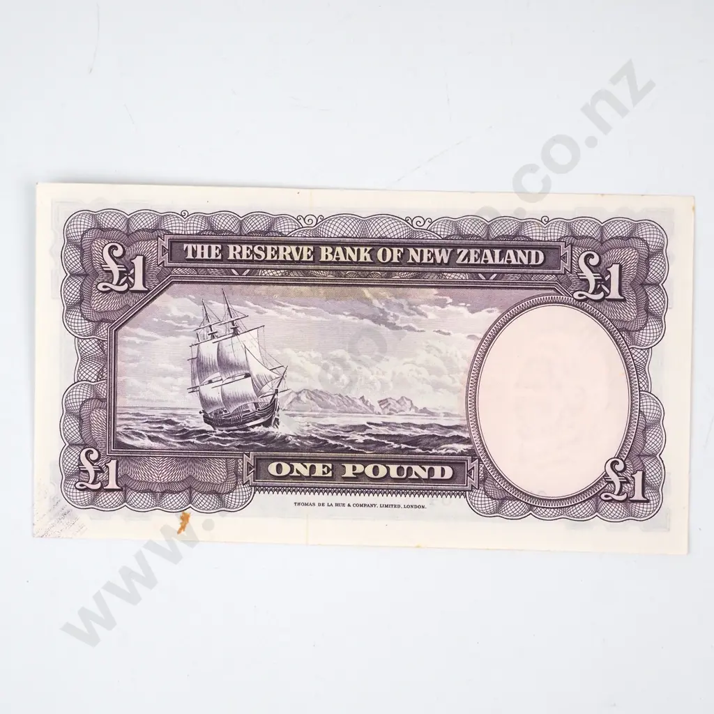 ONE POUND, FLEMING SIGNATURE, SERIAL 284 535704, ALMOST UNCIRCULATED, C.V. $130 Image 1++