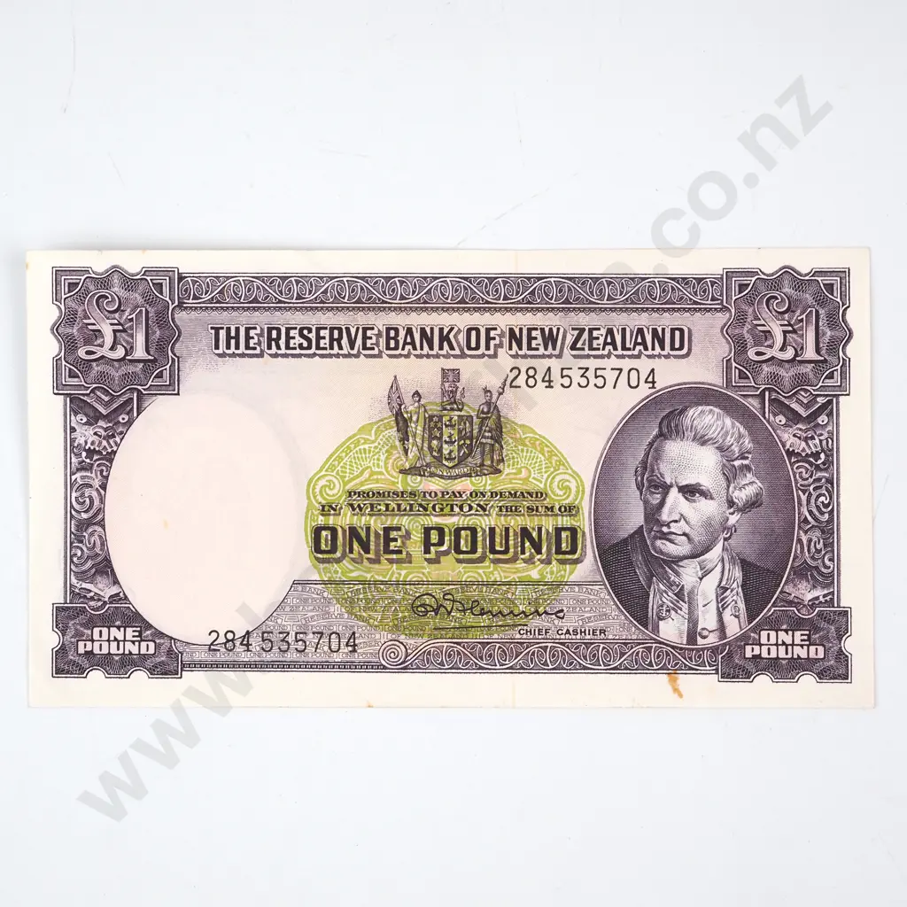 ONE POUND, FLEMING SIGNATURE, SERIAL 284 535704, ALMOST UNCIRCULATED, C.V. $130 Image 1++