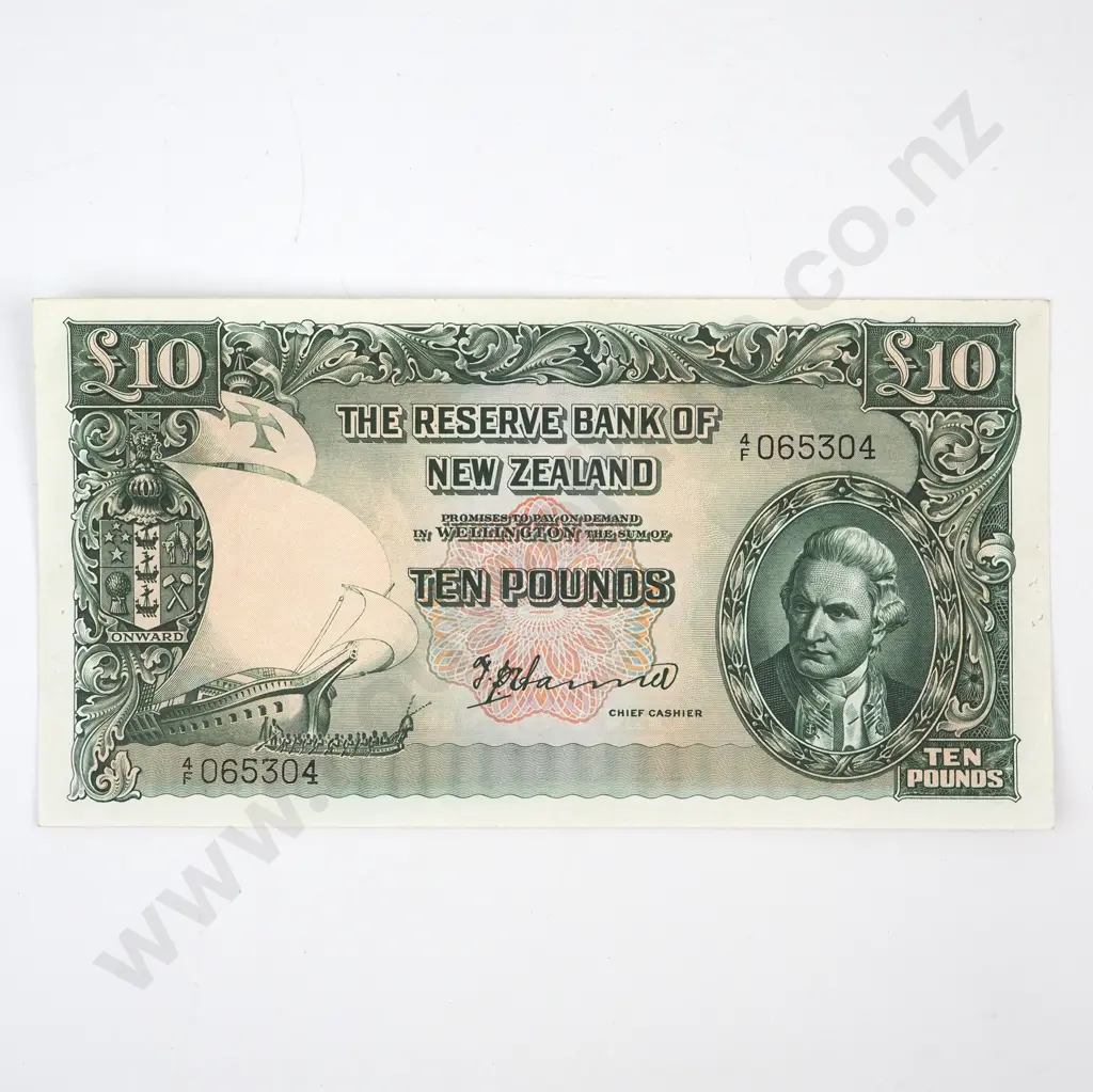 TEN POUNDS, HANNA SIGNATURE, SERIAL 4 OVER F ( LAST PREFIX OF SIGNATURE ), AUNC BUT WITH EIGHT STAPLE HOLES, C.V. $6500 Image 1++