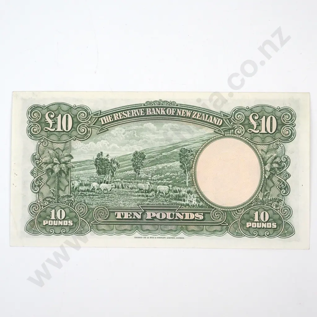 TEN POUNDS, HANNA SIGNATURE, SERIAL 4 OVER F ( LAST PREFIX OF SIGNATURE ), AUNC BUT WITH EIGHT STAPLE HOLES, C.V. $6500 Image 1++