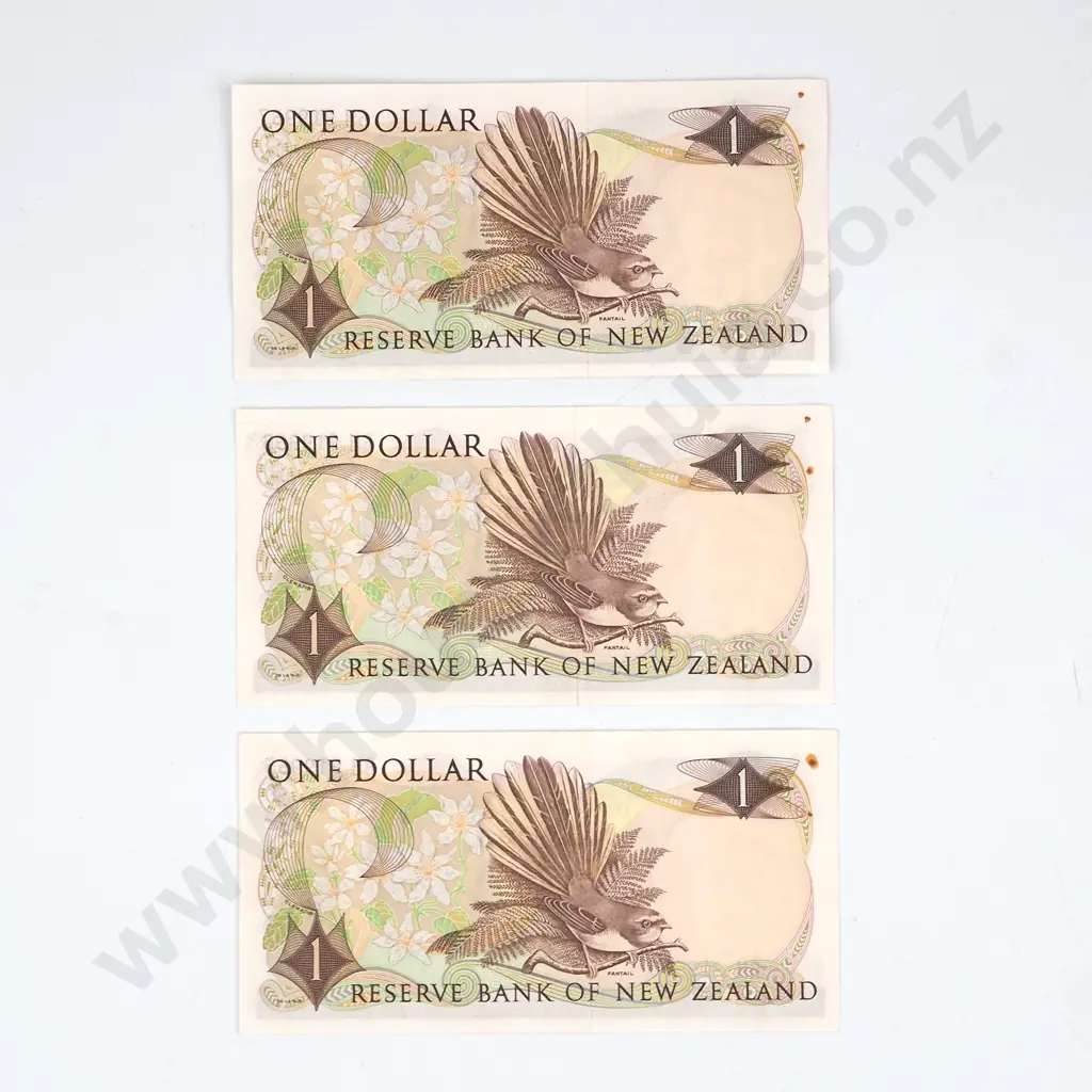 CONSECUTIVELY NUMBERED TRIO WILKS SIGNATURE, SERIALS 6H 919965 / 6/ 7, AUNC BUT WITH TWO RUSTED STAPLE HOLES Image 1++