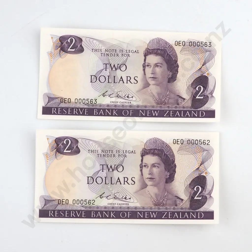 CONSECUTIVELY NUMBERED PAIR WILKS SIGNATURE, SERIALS 0E0 000562 / 3, ( LOW NUMBERS ) ( FIRST PREFIX OF SIGNATURE ), UNCIRCULATED, C.V. $300 Image 1++