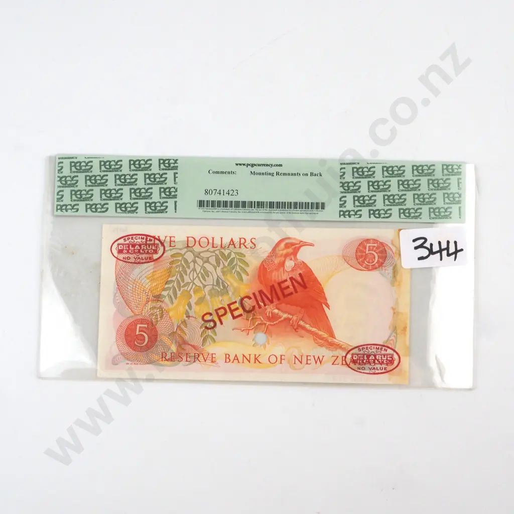 FIVE DOLLARS WILKS SIGNATURE SPECIMEN, SERIAL 025 000000, GRADED AND SLABBED BY PCGS AS CHOICE ABOUT NEW 58 ( TAPE RESIDUE ON THE REVERSE RIGHT MARGIN ) Image 1++