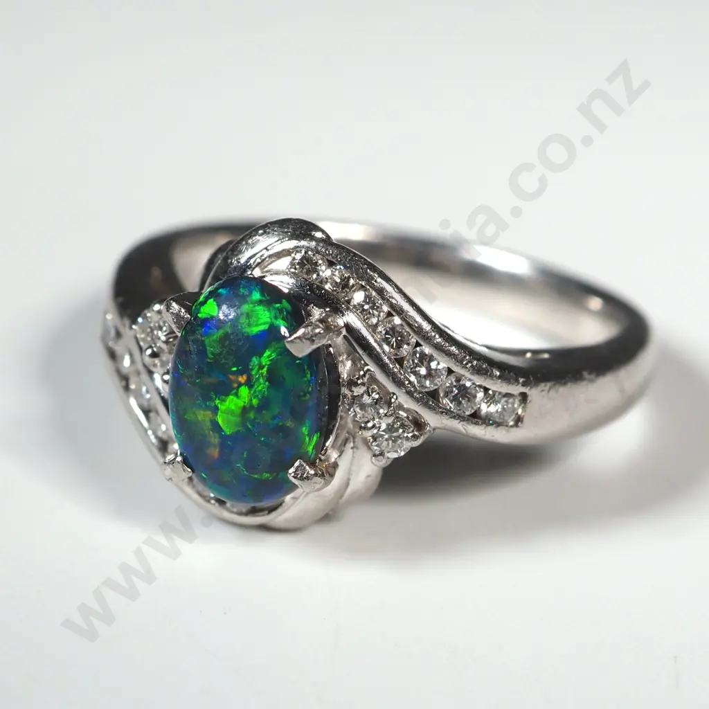 Spectacular Platinum Diamond & Opal Ring - Valued at $3,990.00 Image 1++