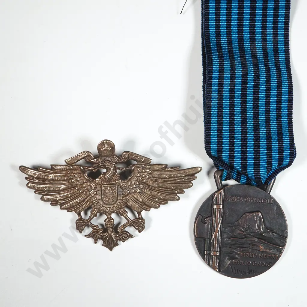 Italian Medal Marked Ethiopia & German tropical Helmet Badge. Image 1++