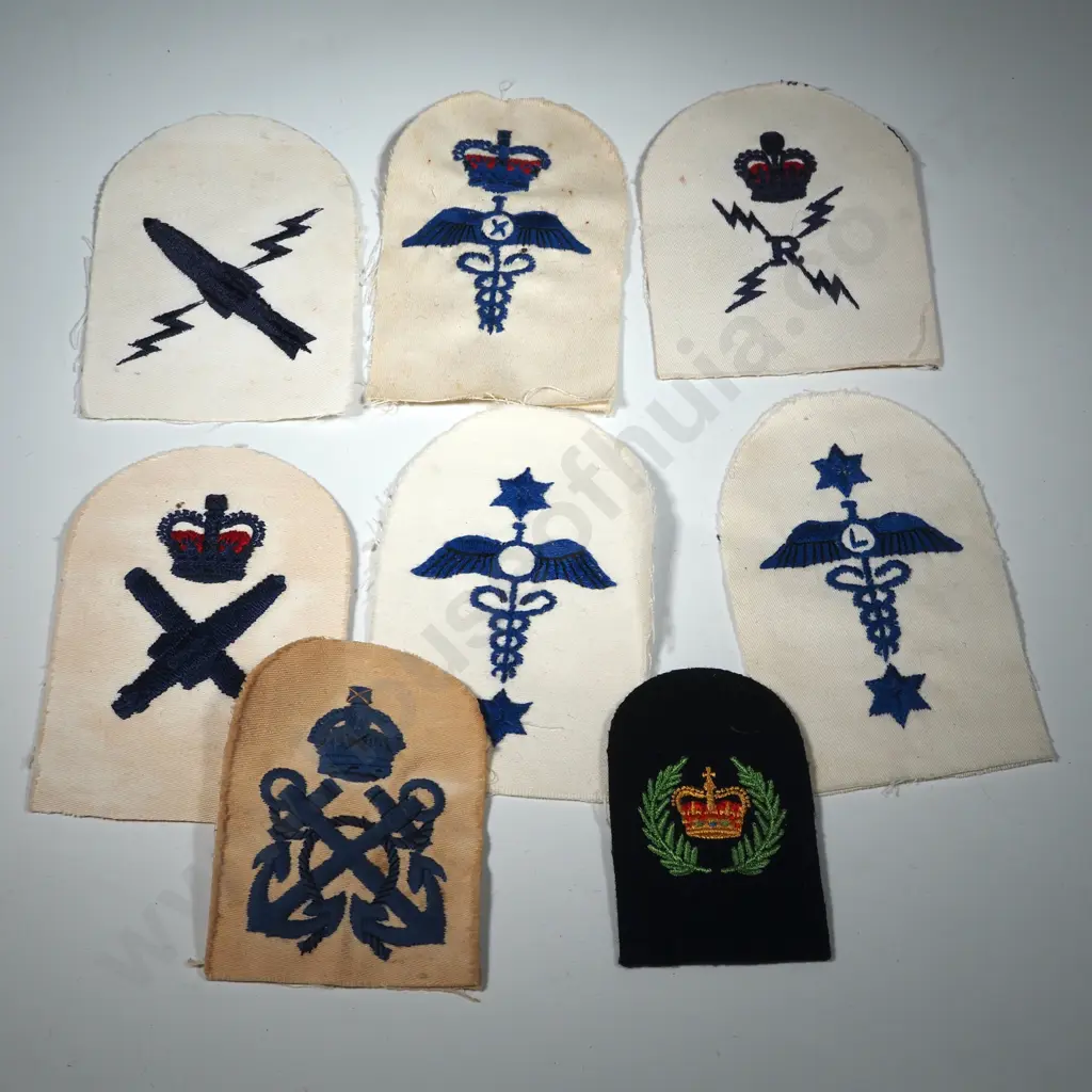 Lot of Eight Naval Badges. Image 1++