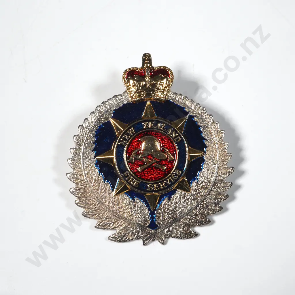 One New Zealand Fire Service Hat Badge w Gold Wash Fern Leaves. Image 1++