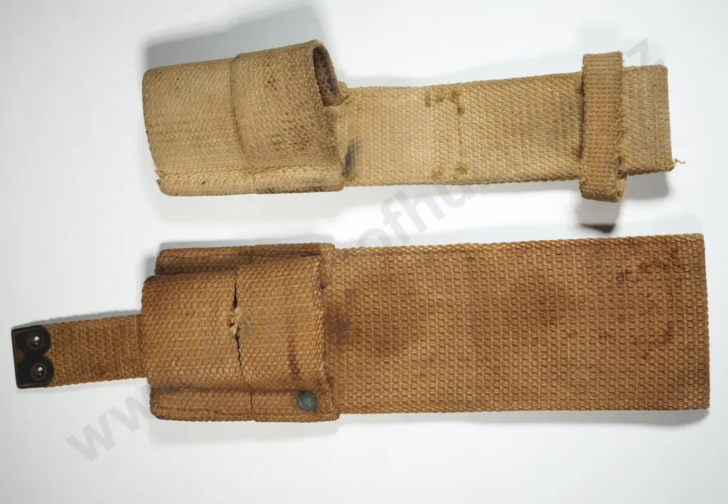 One 1911 Pattern Bayonet Frog & 1937 Pattern Bayonet Frog. Image 1++