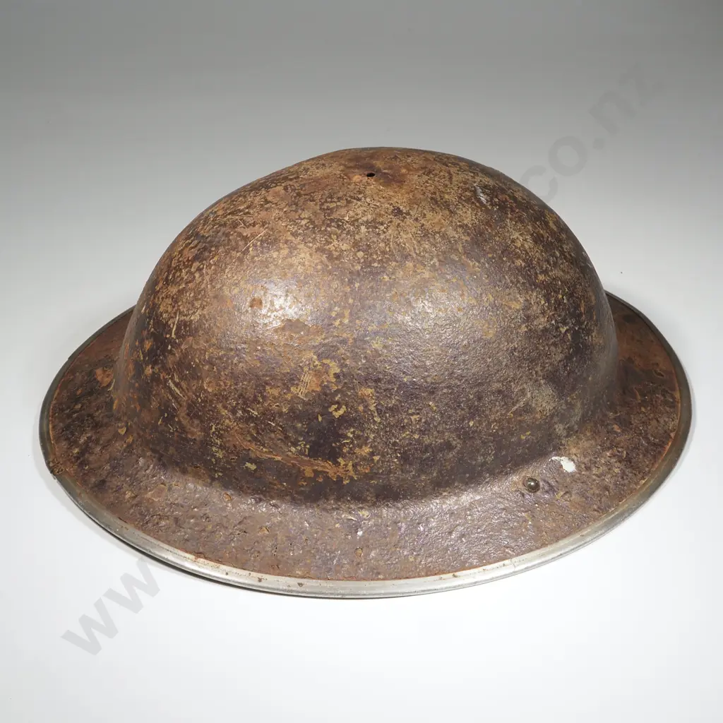 WWII Rolled Edge Tin Helmit. Image 1++