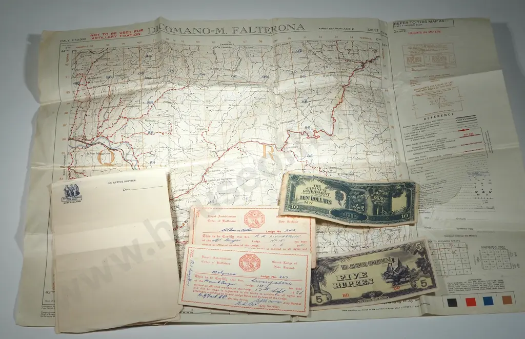 1944 Map, Japanese Bank Notes, Active Service Note Paper, Two Lodge Membership Cards. Image 1++