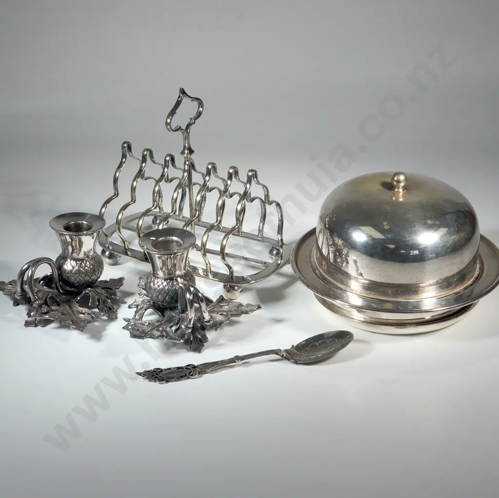 Silver Plate Toast Rack, Silver Plate Entree Dish, A Pair Of  EPBM  Thistle Candlesticks & An Ornate Jam Spoon Image 1++