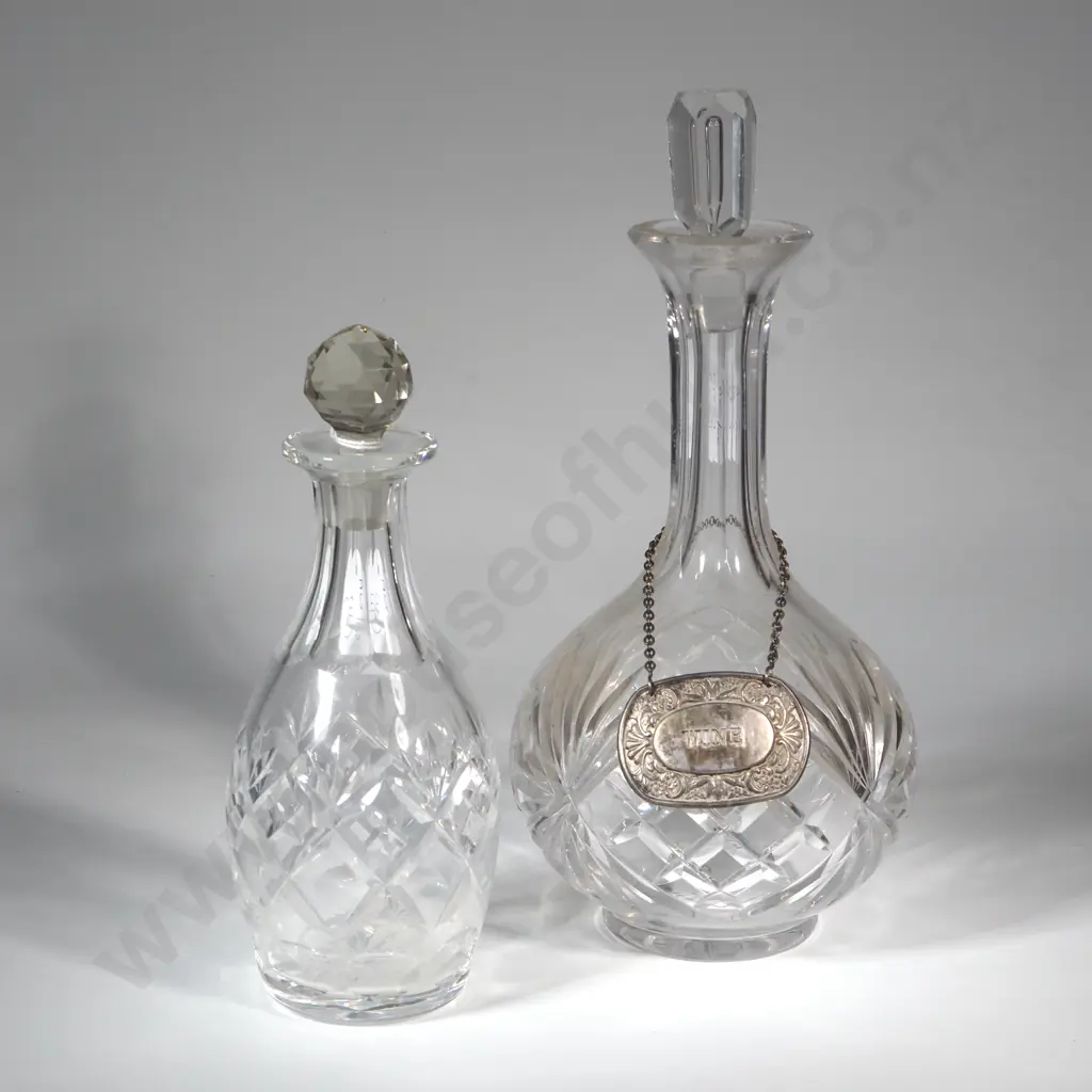 Two Cut  Crystal Decanters - One with wine Label & The Other A Small Decanter . Image 1++