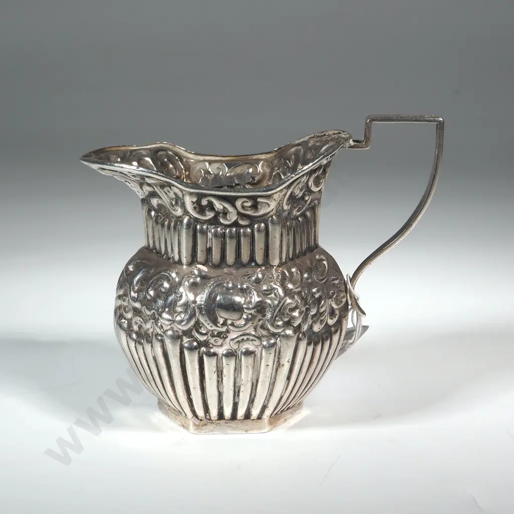 Embossed Sterling Silver Cream Jug. Birm 1905. Maker William Davenport  Image 1++