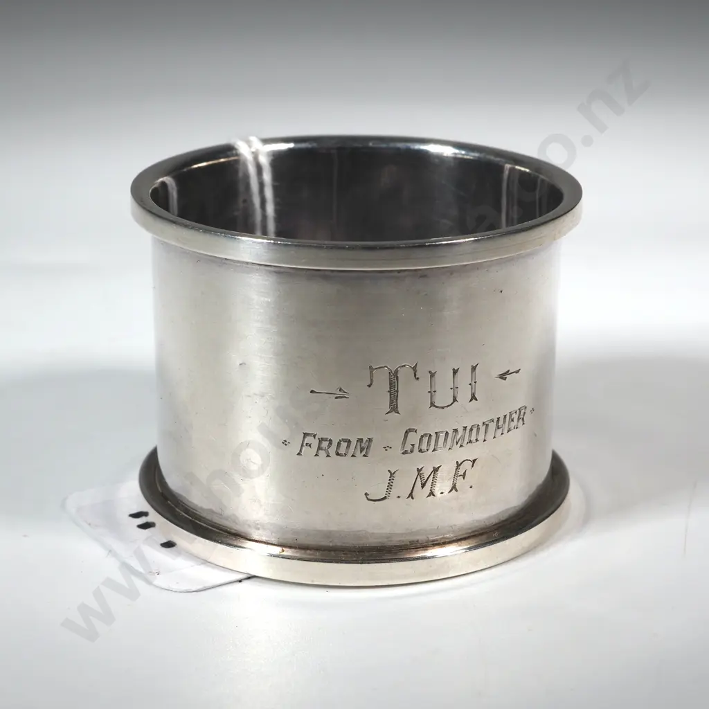 Sterling Silver Plain Bodied Serviette Ring. Inscribed "Tui, From Godmother JMF". Image 1++