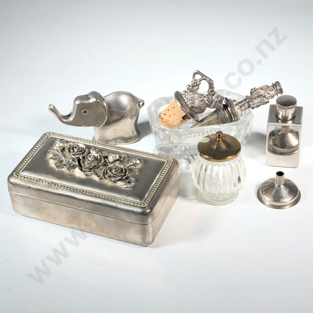 Collection of Metal Items To Include An Oblong Trinket Box with Embossed Roses, Two Bottle Stoppers. Stylised Elephant Image 1++