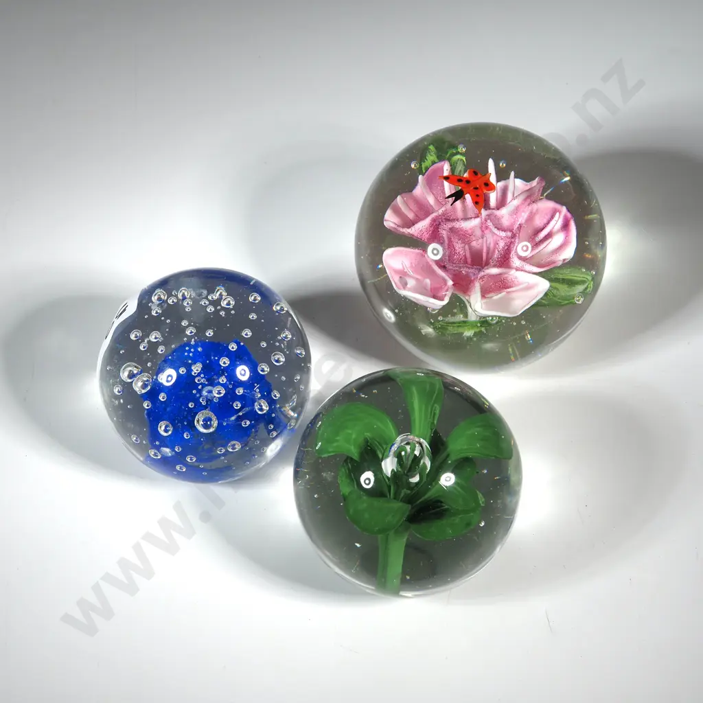 Three Glass Paperweights - One w Blue & Bubbles, A Green Flower Centre & a Pink Flower Centre. Image 1++