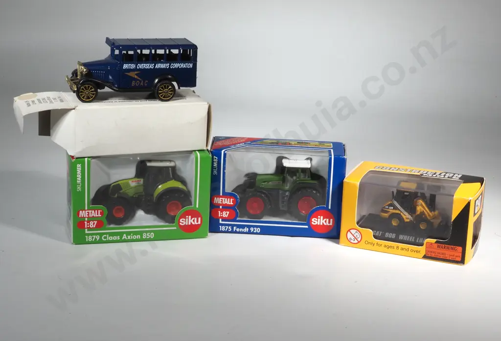 Four Cased Toy Cars  Image 1++