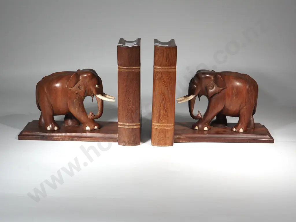 Pair of Teak Elephant Book Stands. Image 1++
