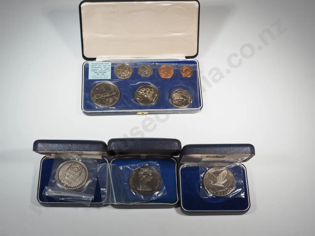 Three New Zealand Cased Proof Dollars & 1969 Cased Cook Commemorative Issue Image 1++