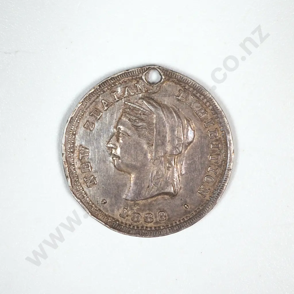 1882 New Zealand Exhibition Silver Token  Image 1++