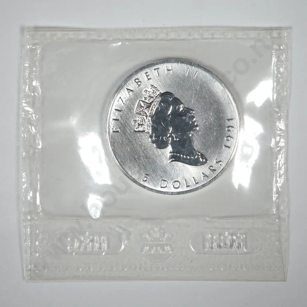 1991 Canadian Maple One Ounce Silver Coin in RCM Packaging  Image 1++