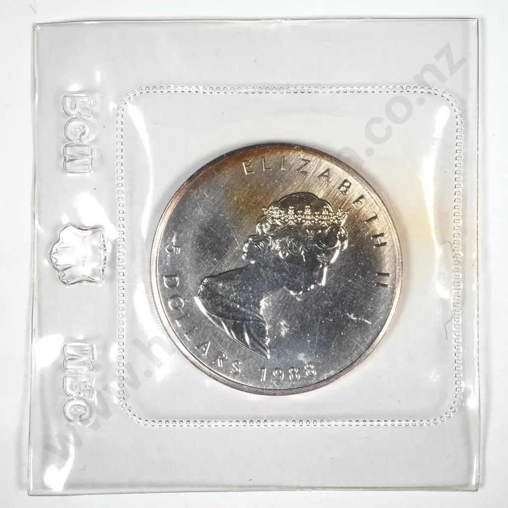1988 Canadian Maple One Ounce Silver Coin in RCM Packaging  Image 1++