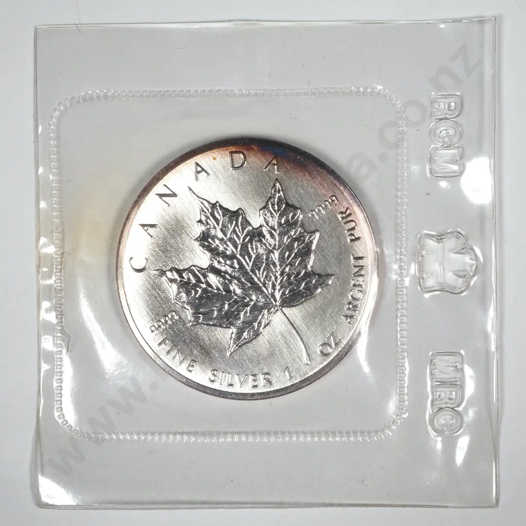 1988 Canadian Maple One Ounce Silver Coin in RCM Packaging  Image 1++
