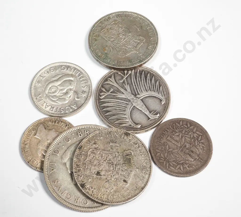 61 Grams of Assorted International Silver Coinage  Image 1++