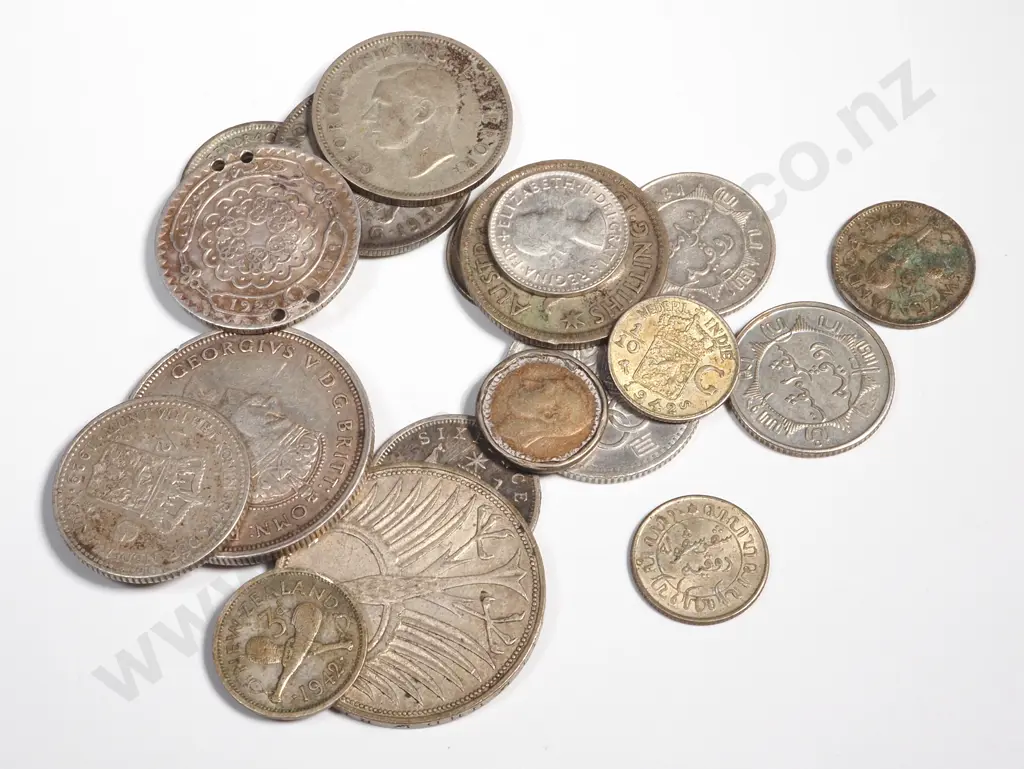 77 Grams of Assorted International Silver Coinage  Image 1++