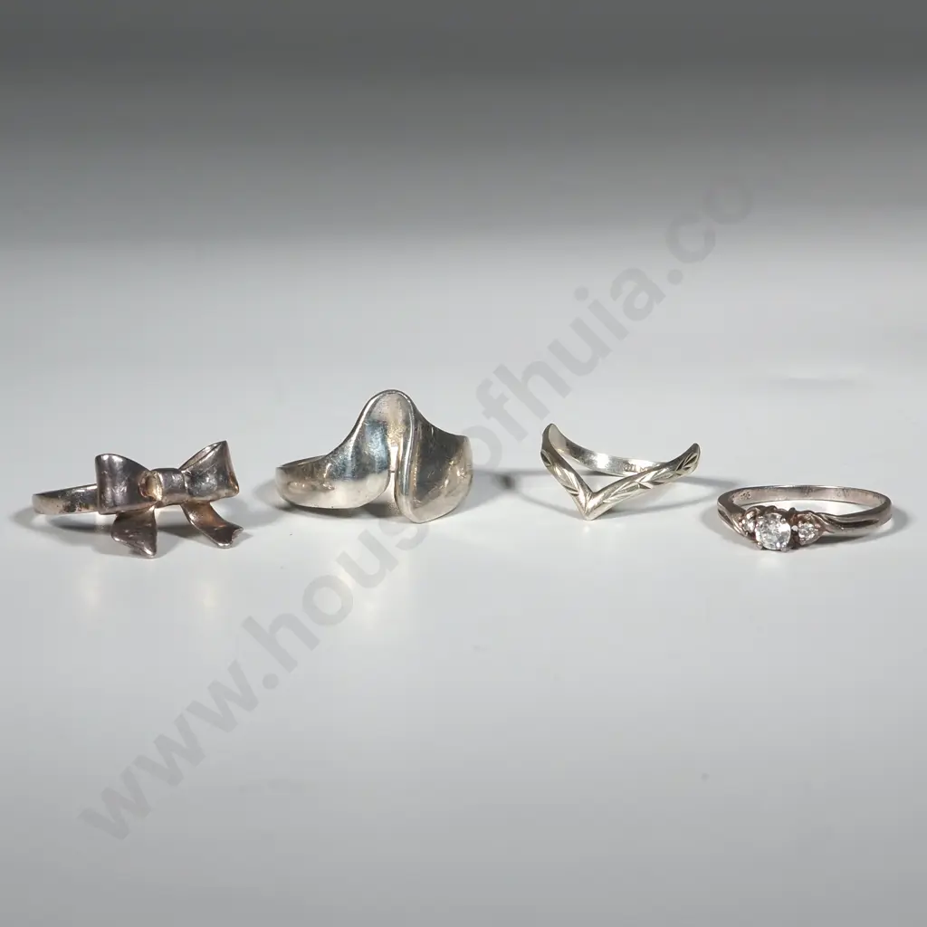 Four Sterling Silver Rings. One with A Bow Image 1++