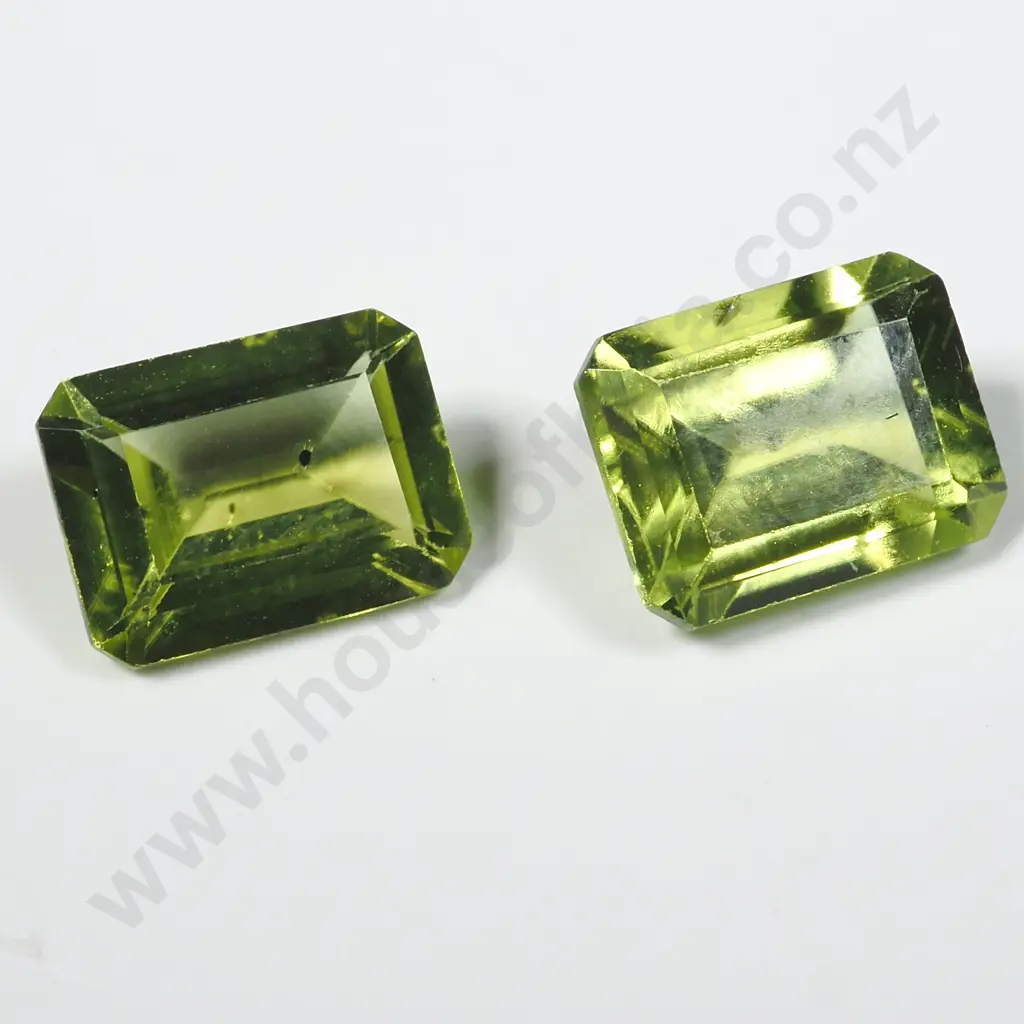 Loose Pair Emerald Cut Peridots. Image 1++