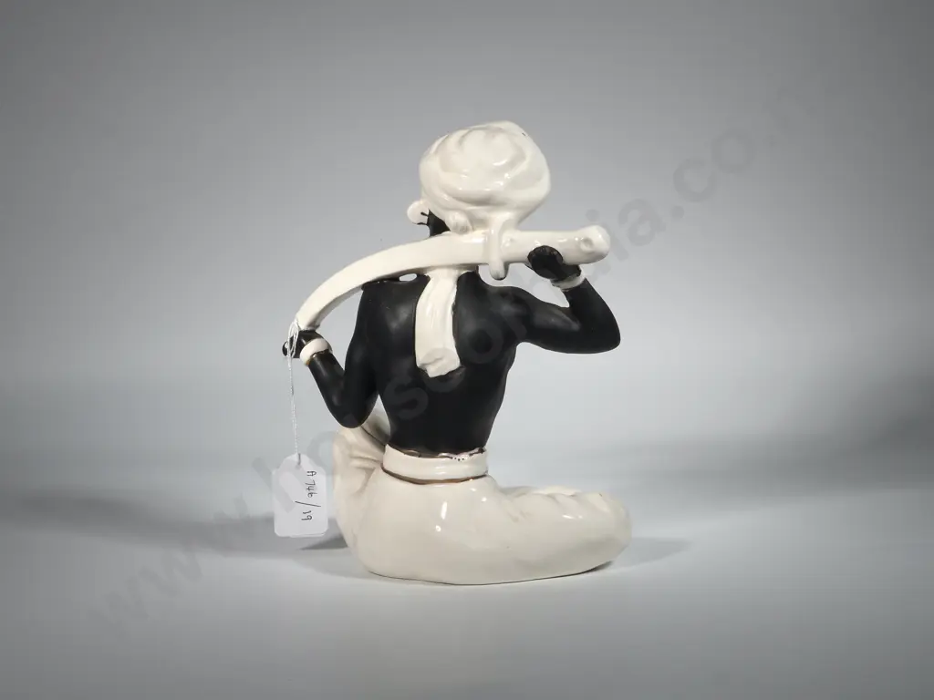 Figure of a Seated Man w Turban & Sword. Image 1++