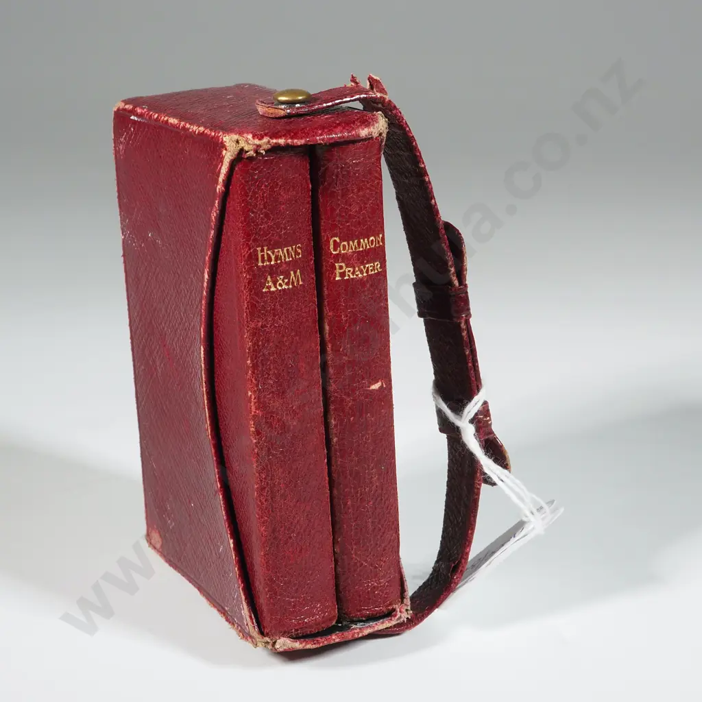 Decorative Cupid Pattern Sterling Silver Fronted Leather Holder Containing Two Volumes - Hymns A & M, & Common Prayer. Image 1++