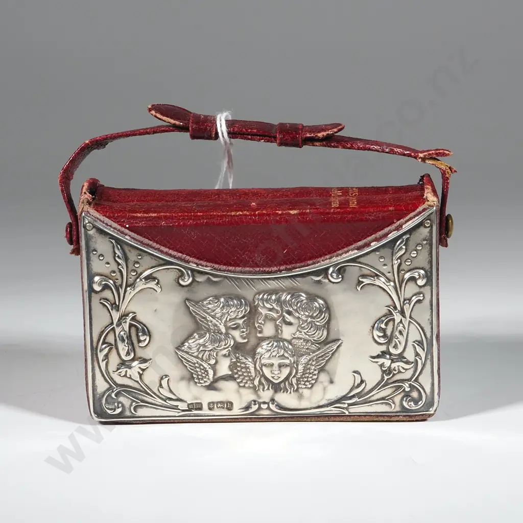 Decorative Cupid Pattern Sterling Silver Fronted Leather Holder Containing Two Volumes - Hymns A & M, & Common Prayer. Image 1++