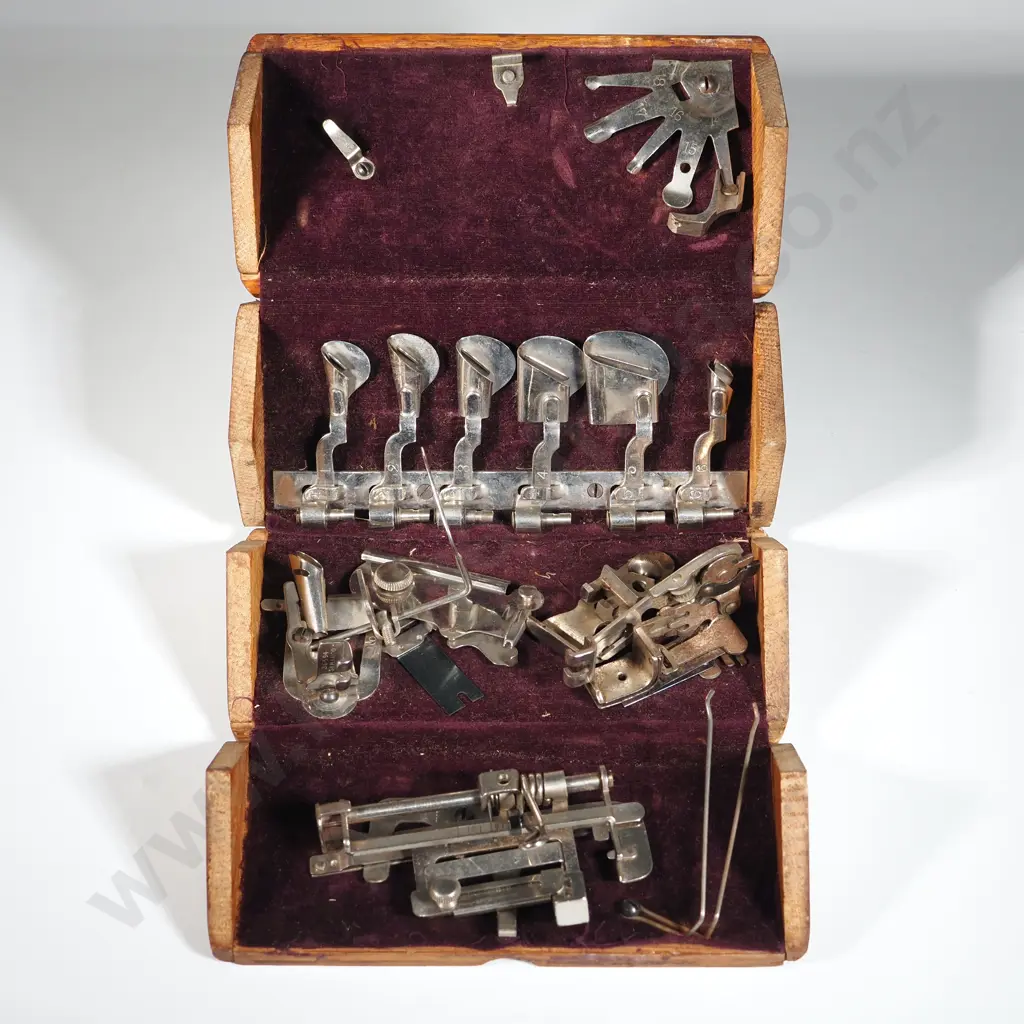 Wooden Box Containing Various Sewing Machine Foot Attachments. Image 1++